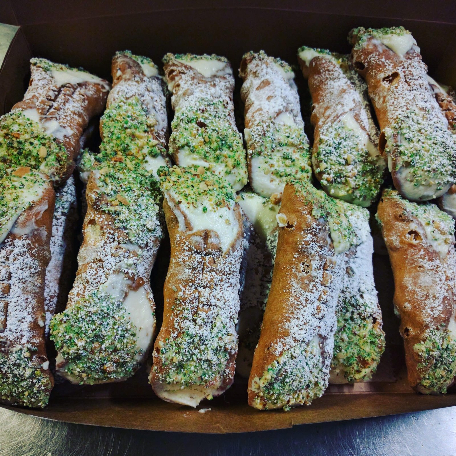 Classic Italian cannoli with ricotta filling with pistachios from Rosie’s Sidekick Sandwich Shop